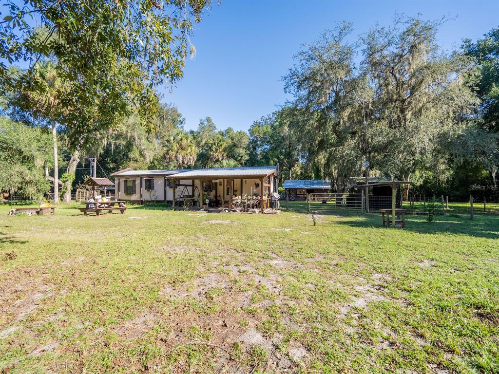 15429 Northeast 38th Court Citra, FL 32113 - Photo 39 of 53 a view of a house with a yard