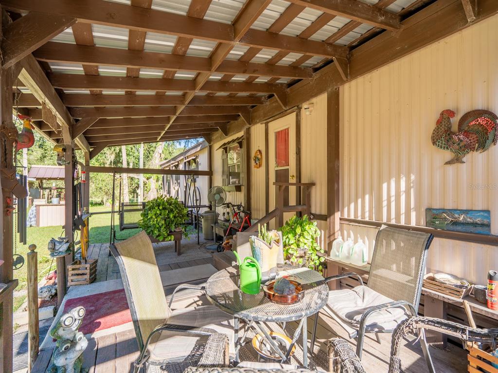 15429 Northeast 38th Court Citra, FL 32113 - Photo 5 of 53 a outdoor space with furniture