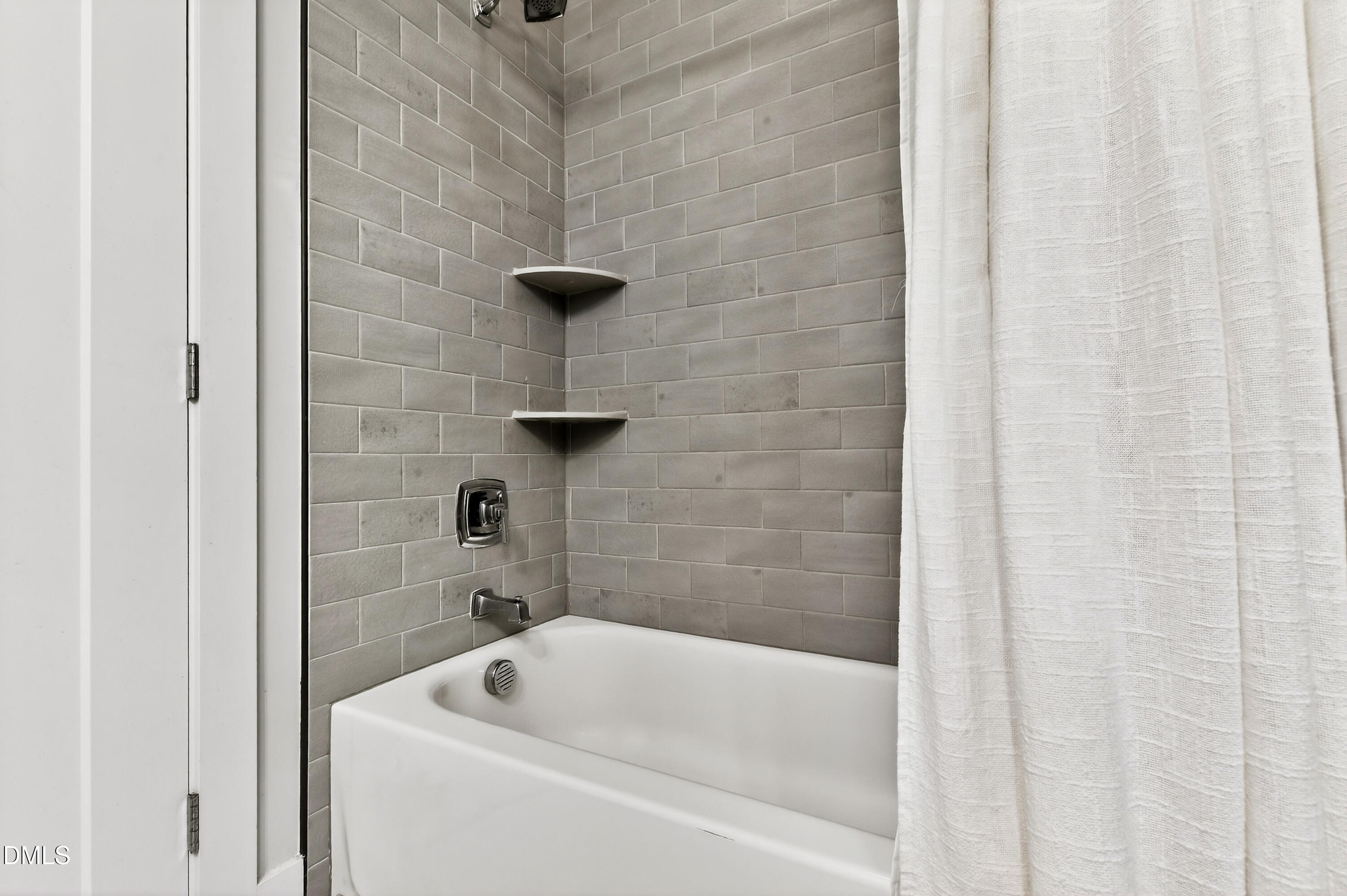 1116 Hymettus Court Raleigh, NC 27607 - Photo 51 of 69 a bathroom with a tub
