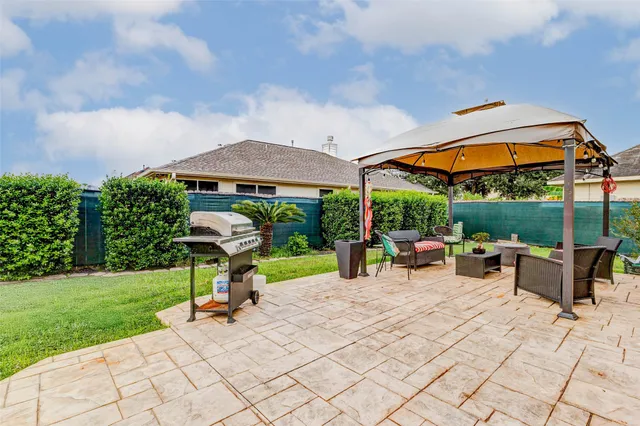 a house view with a garden space