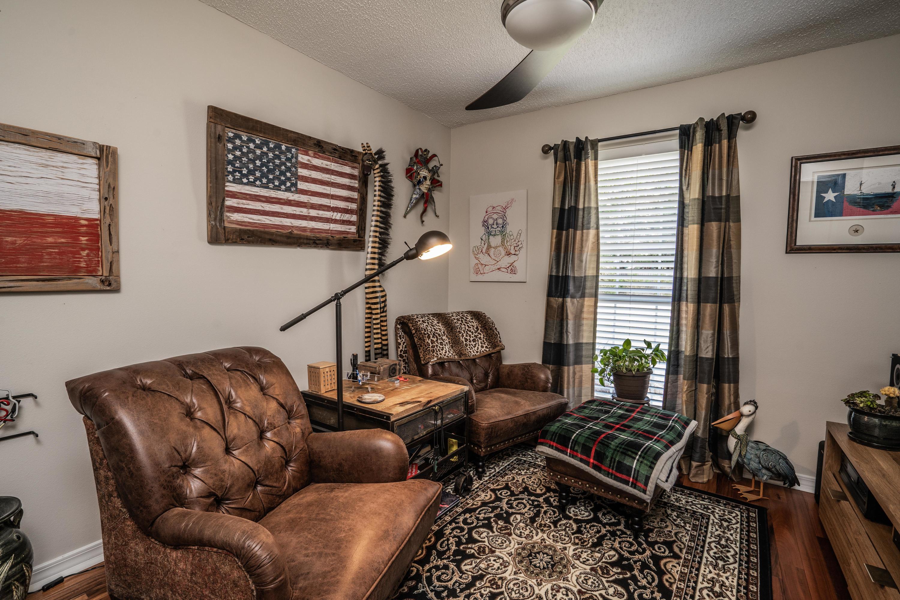 4258 Shadow Lane Niceville, FL 32578 - Photo 26 of 36 a living room with furniture rug and window