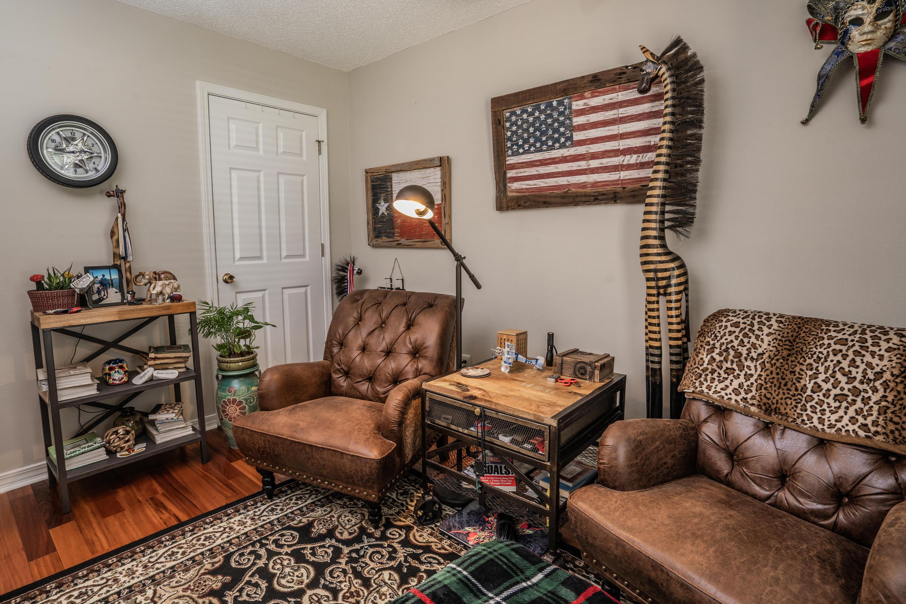 4258 Shadow Lane Niceville, FL 32578 - Photo 27 of 36 a living room with furniture a rug and a window