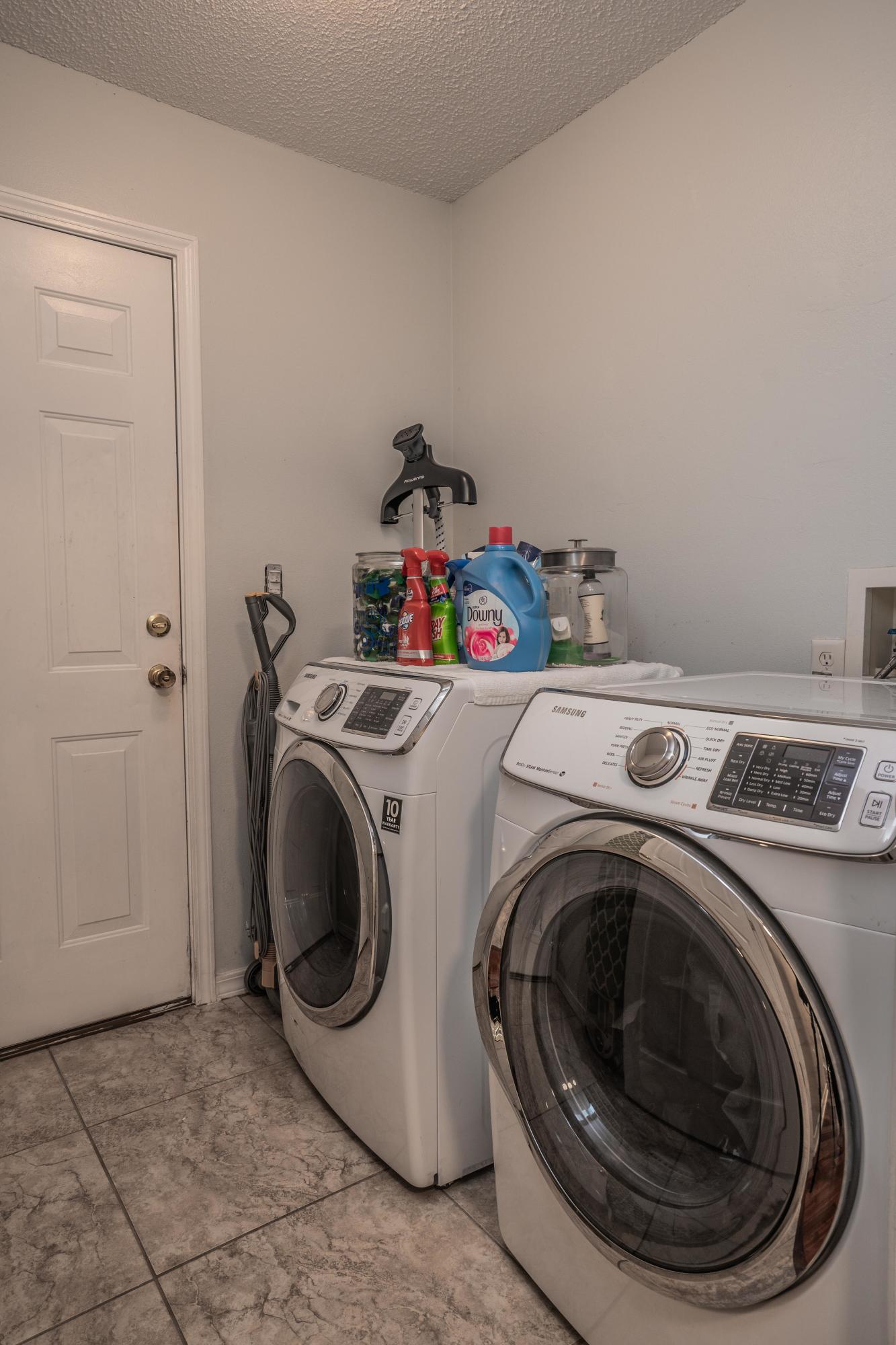 4258 Shadow Lane Niceville, FL 32578 - Photo 29 of 36 a utility room with dryer and washer