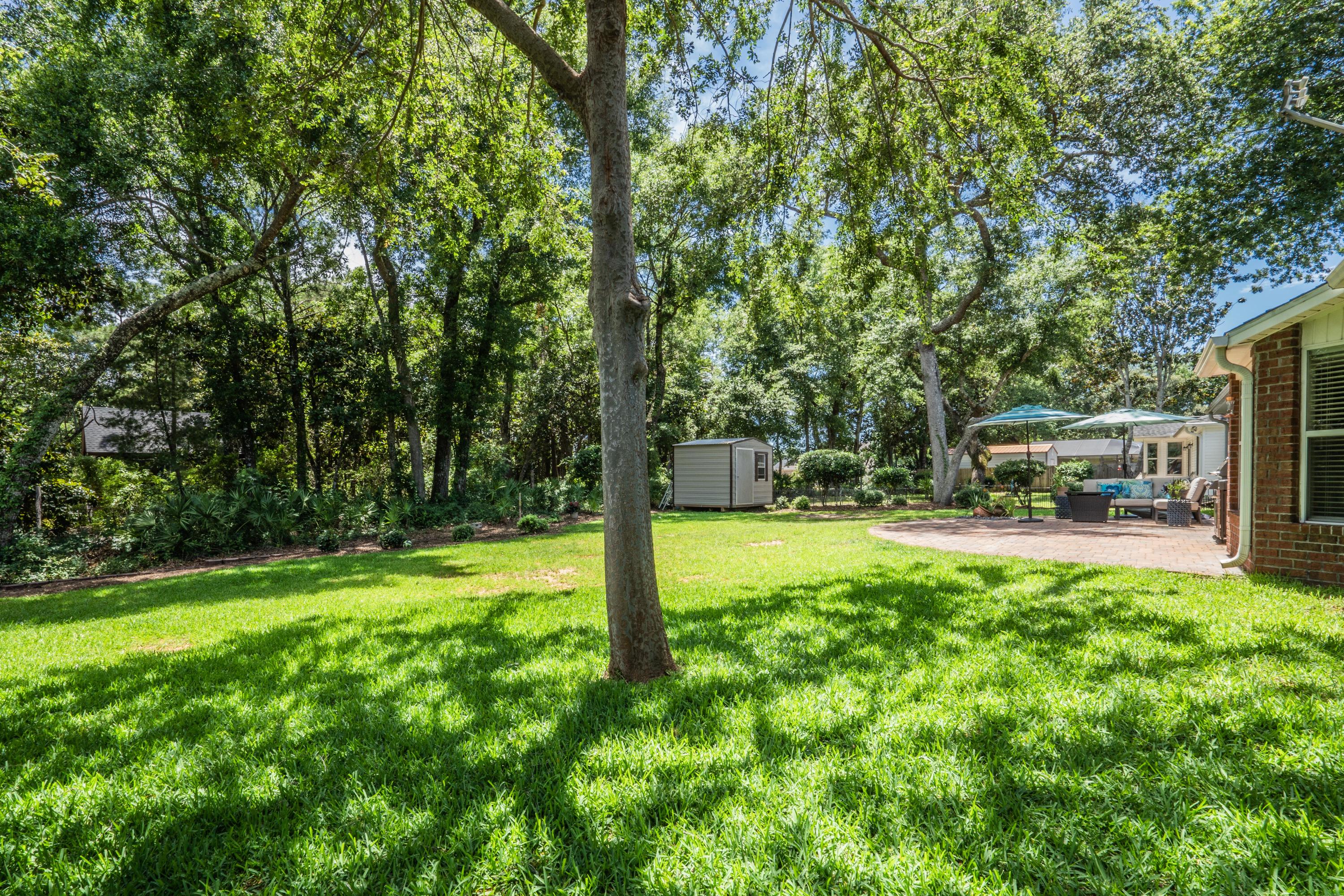 4258 Shadow Lane Niceville, FL 32578 - Photo 35 of 36 a view of a house with swimming pool and sitting area