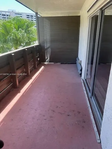 a view of a building from a balcony