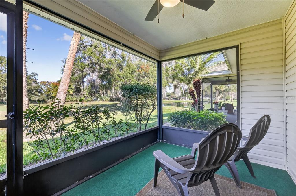 579 Juniper Way Tavares, FL 32778 - Photo 29 of 46 a view of a chairs and table in balcony