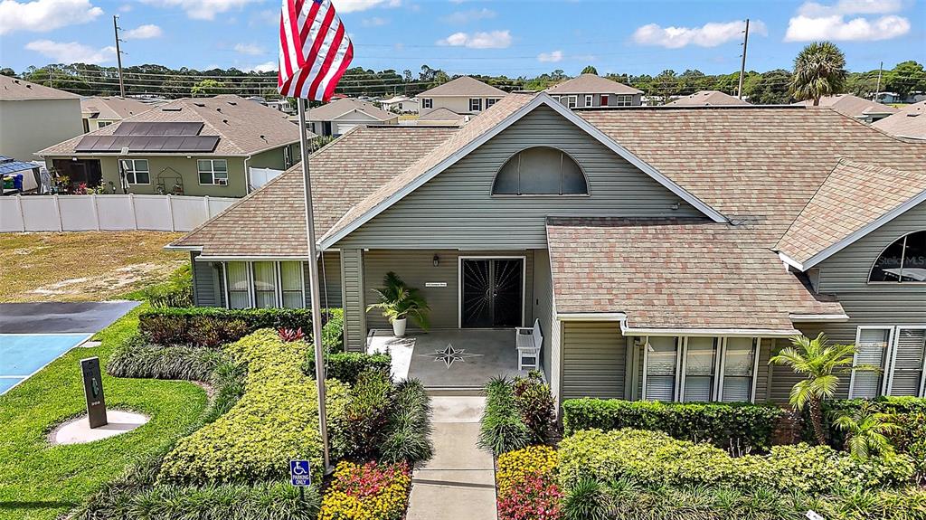 579 Juniper Way Tavares, FL 32778 - Photo 44 of 46 a aerial view of a house with a yard