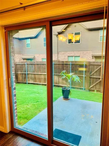a view of a porch with a small yard