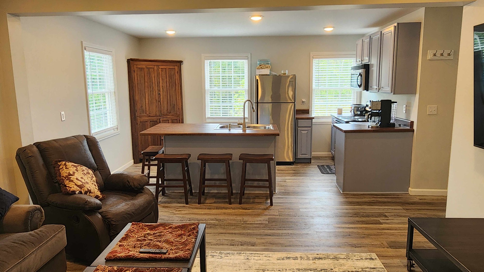 281 Bill Hunter Road Celina, TN 38551 - Photo 14 of 55 a view of a dining room with furniture and wooden floor