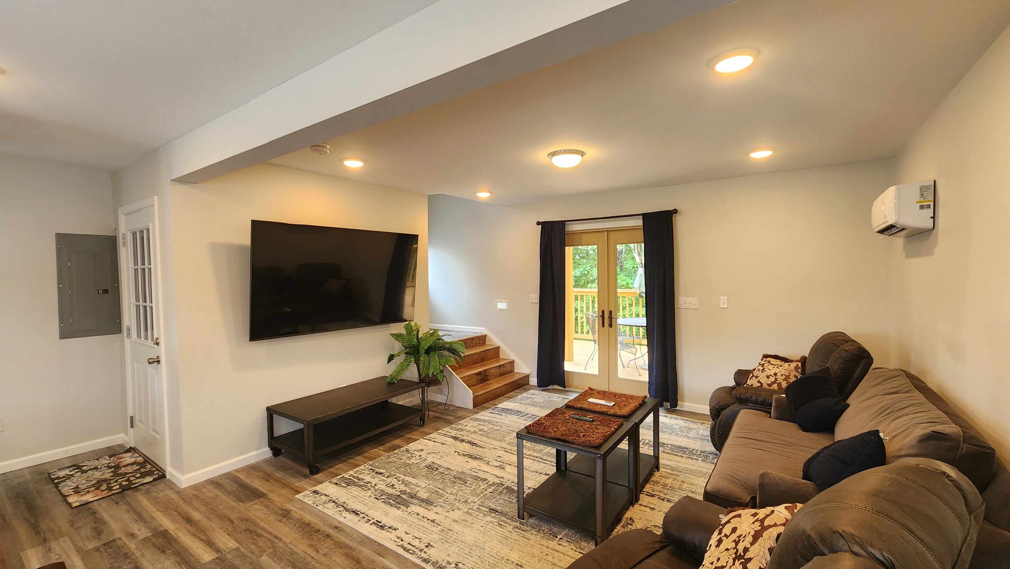 281 Bill Hunter Road Celina, TN 38551 - Photo 20 of 55 a living room with furniture and a flat screen tv