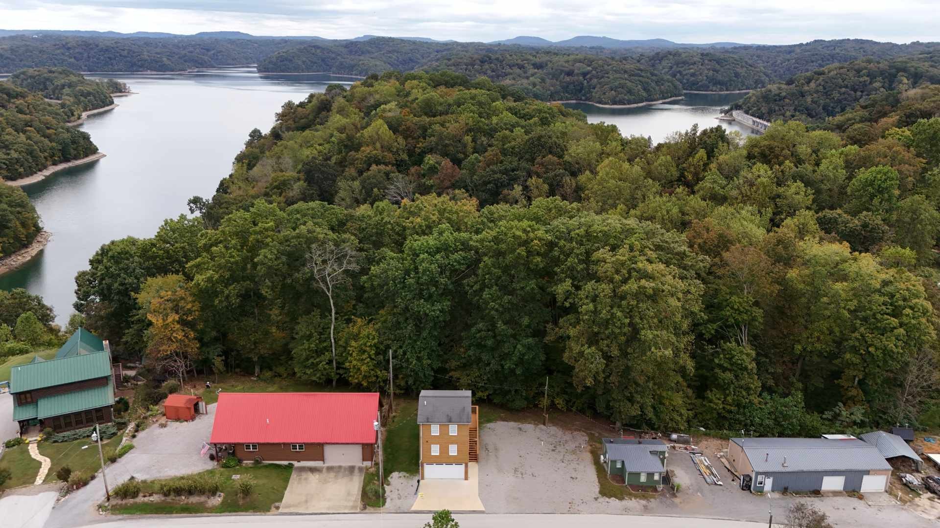 281 Bill Hunter Road Celina, TN 38551 - Photo 33 of 55 an aerial view of residential houses and outdoor space