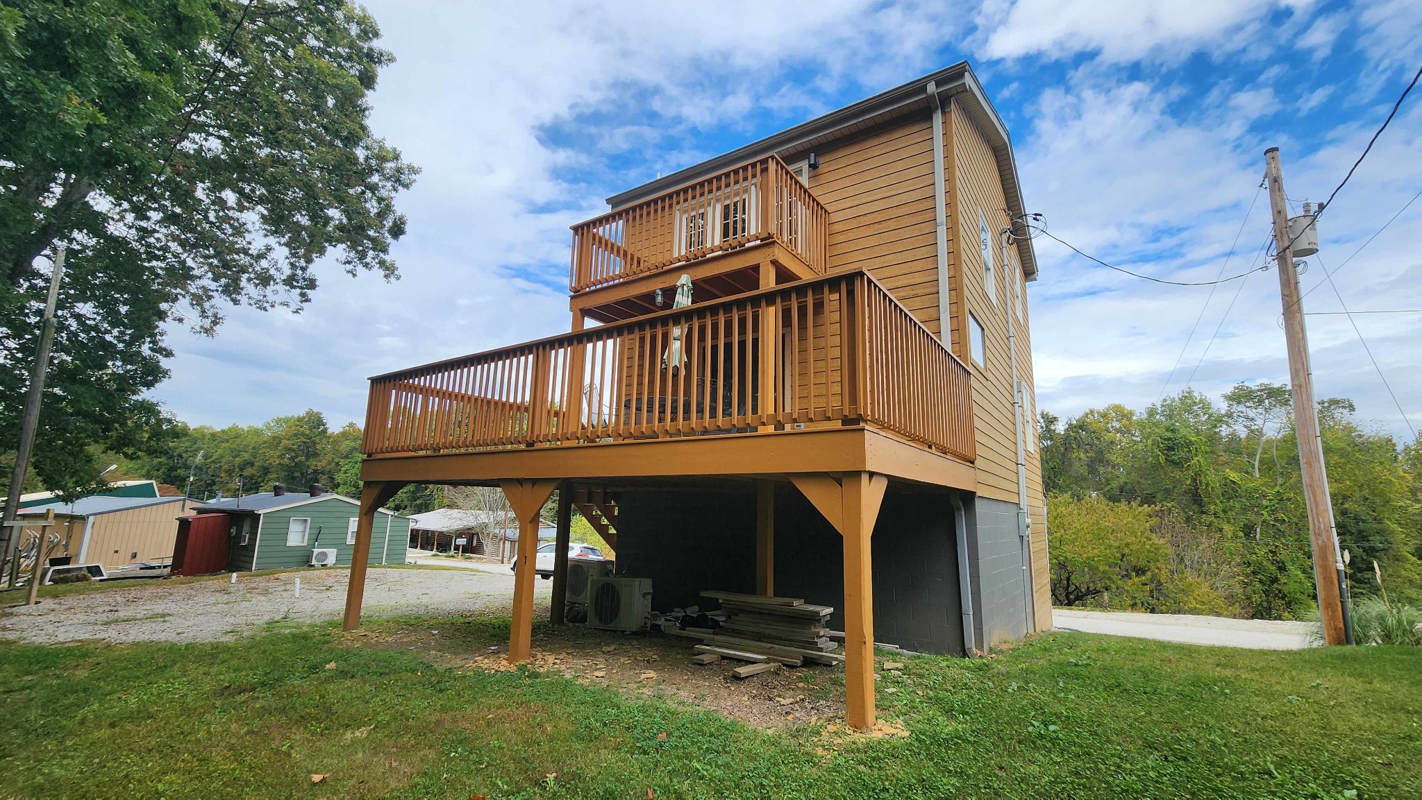 281 Bill Hunter Road Celina, TN 38551 - Photo 37 of 55 a view of a house with a yard