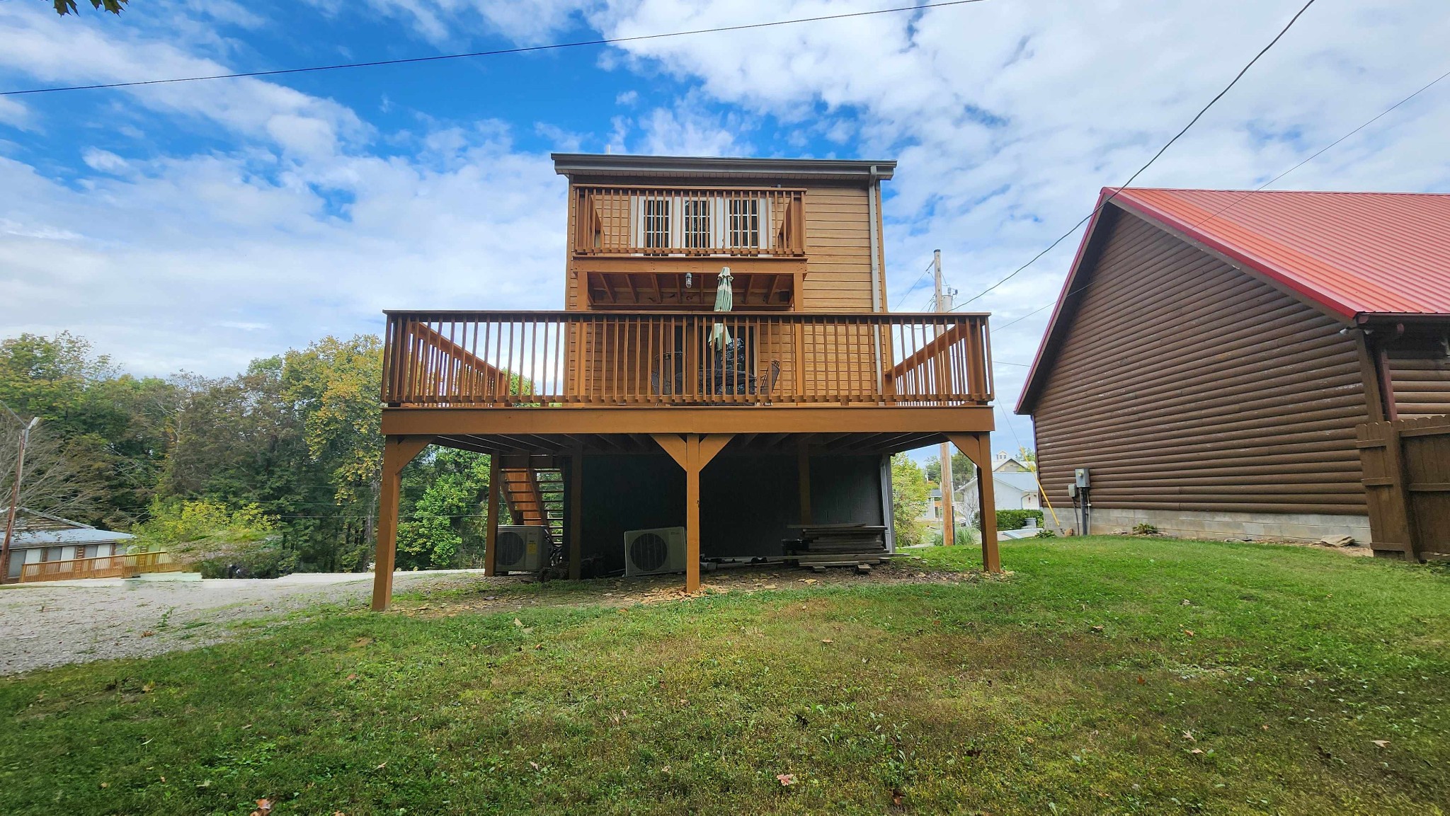 281 Bill Hunter Road Celina, TN 38551 - Photo 40 of 55 a front view of a house with a yard