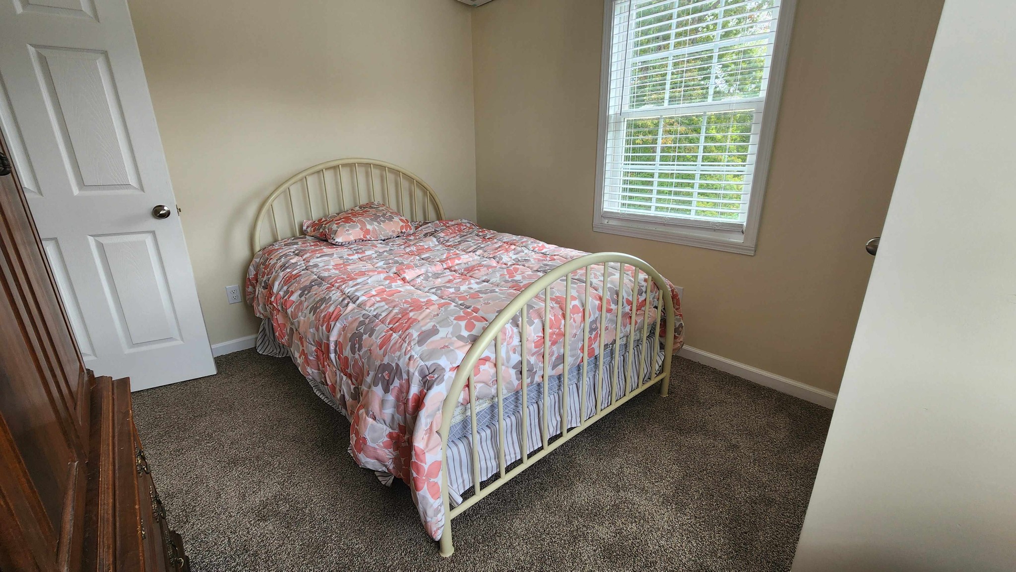 281 Bill Hunter Road Celina, TN 38551 - Photo 4 of 55 a bed sitting in a bedroom next to a window