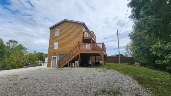 a view of balcony with wooden floor