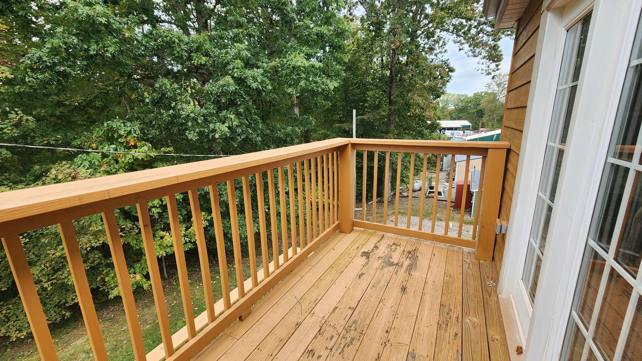 281 Bill Hunter Road Celina, TN 38551 - Photo 45 of 55 a view of balcony with wooden floor and fence