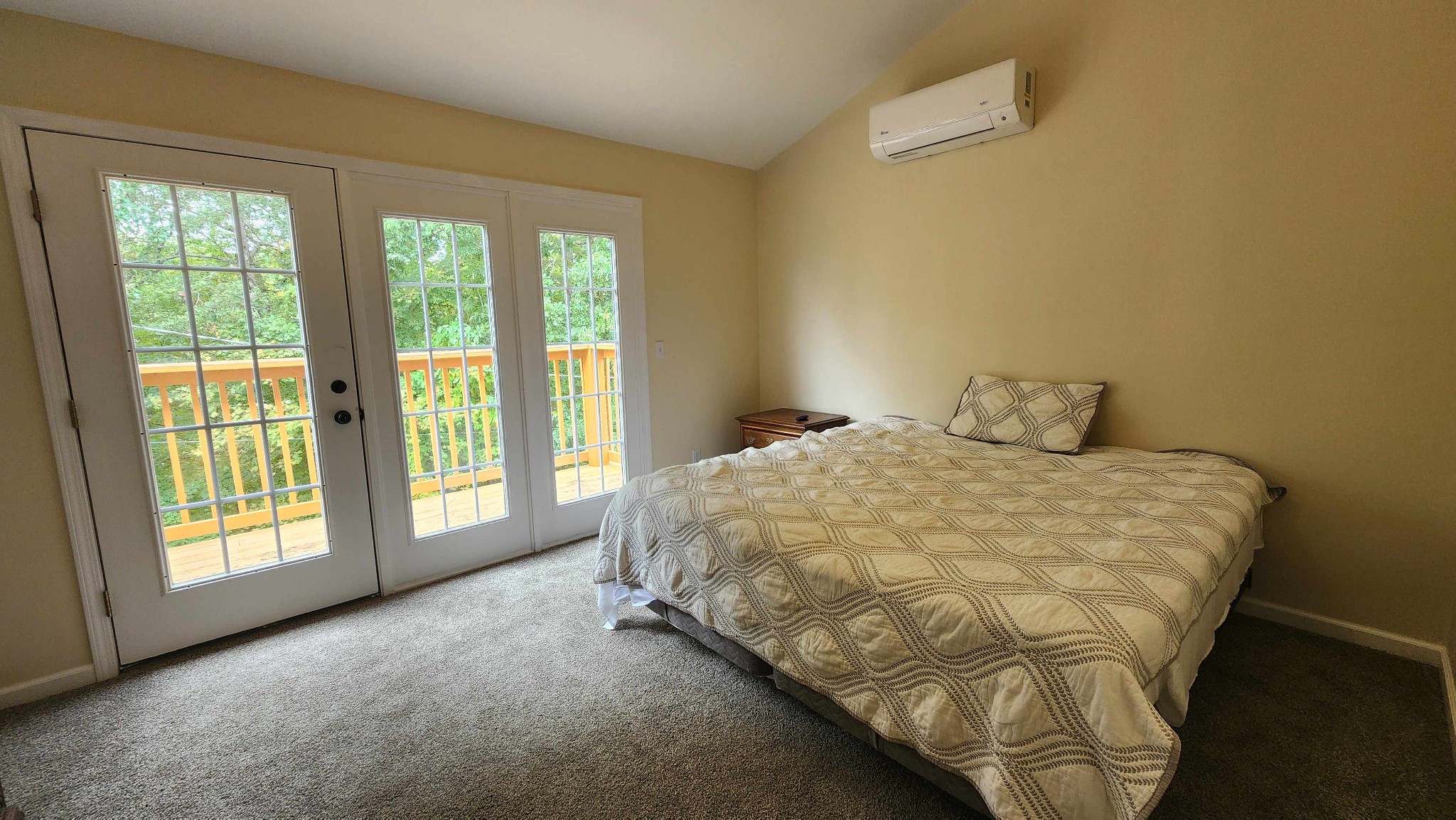 281 Bill Hunter Road Celina, TN 38551 - Photo 7 of 55 a bed sitting in a room next to a window