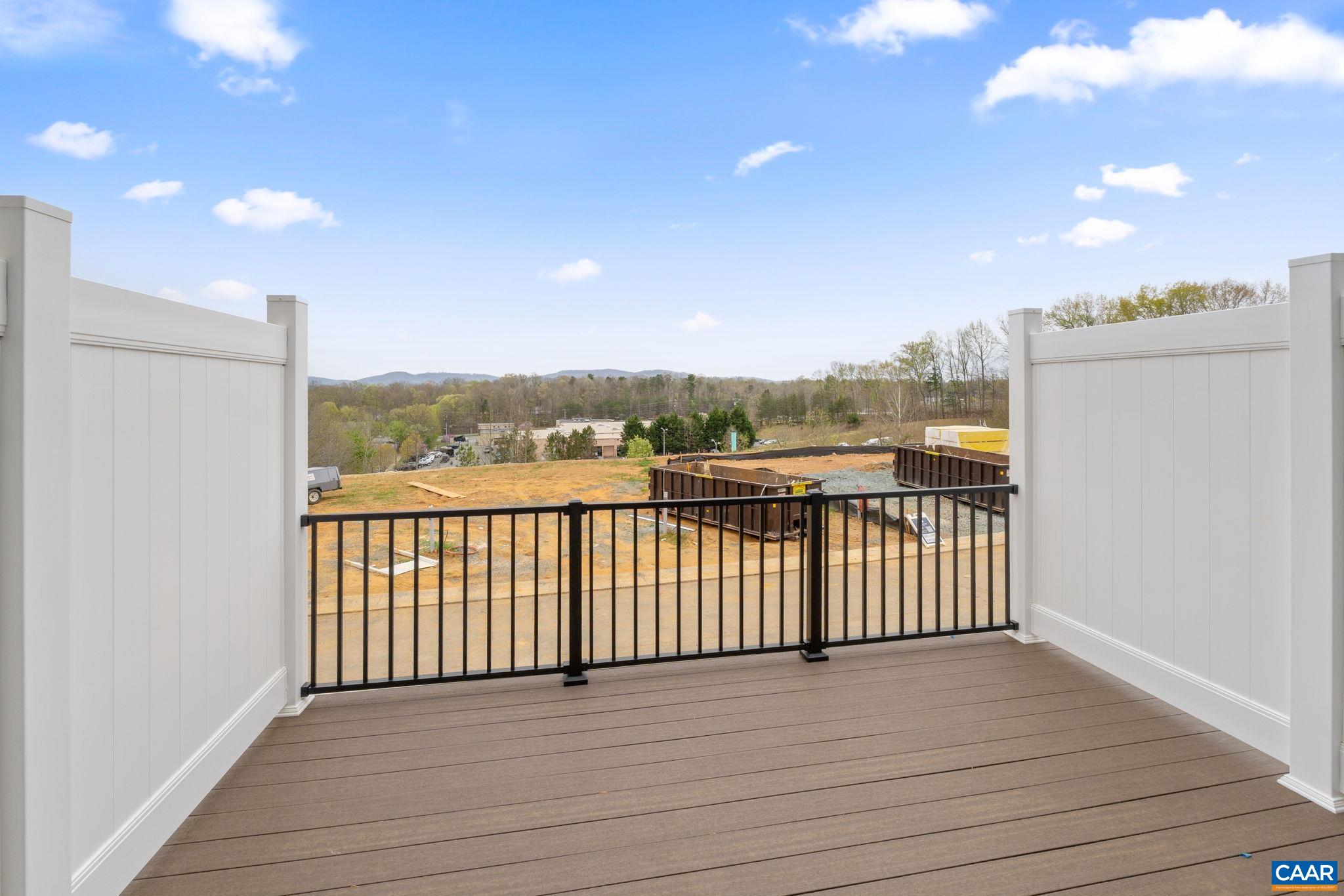 2249 Woodburn Road Charlottesville, VA 22901 - Photo 21 of 34 a view of a balcony with wooden fence