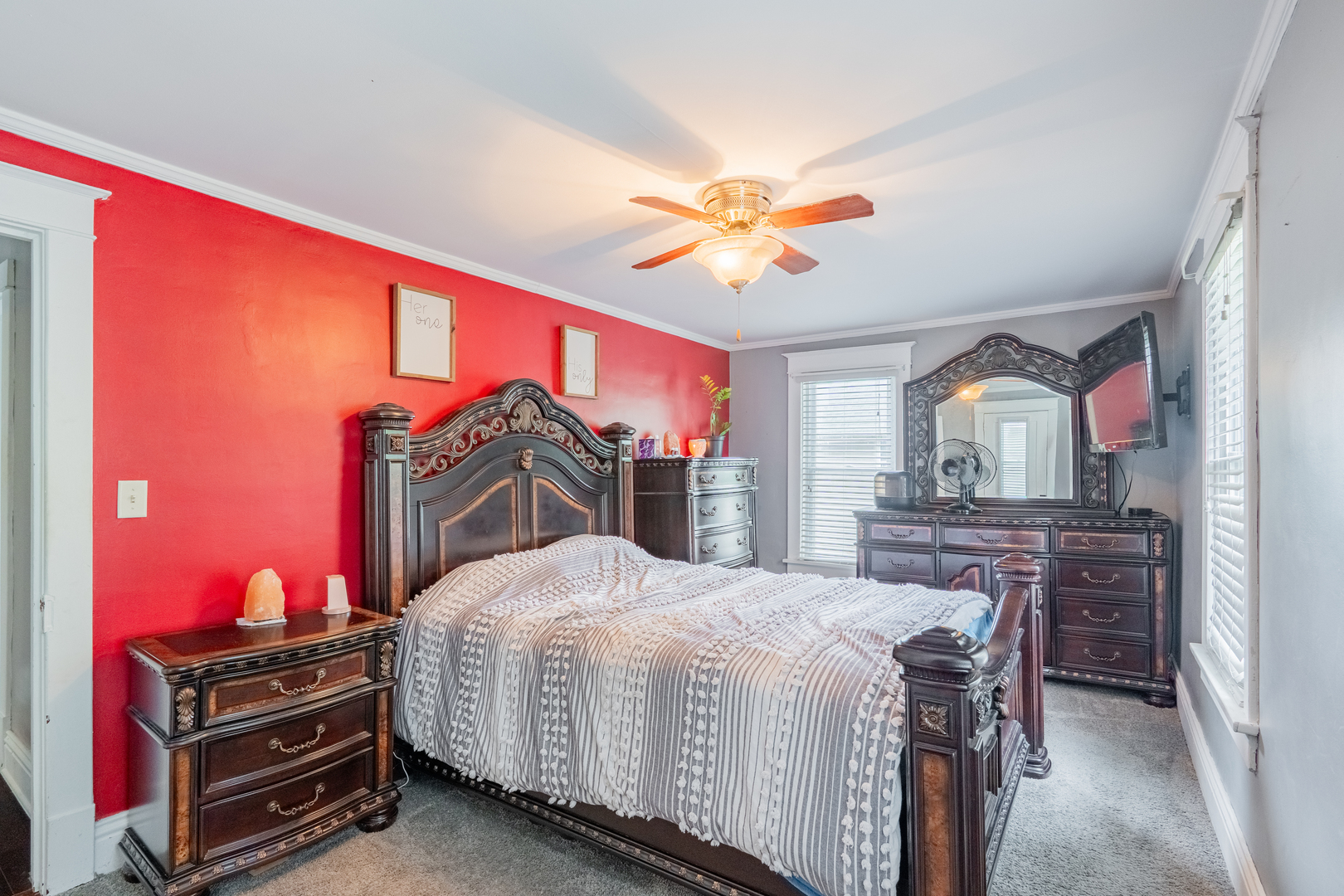 310 South Pleasant Street Princeton, IL 61356 - Photo 12 of 36 a bedroom with a bed dresser and a flat screen tv