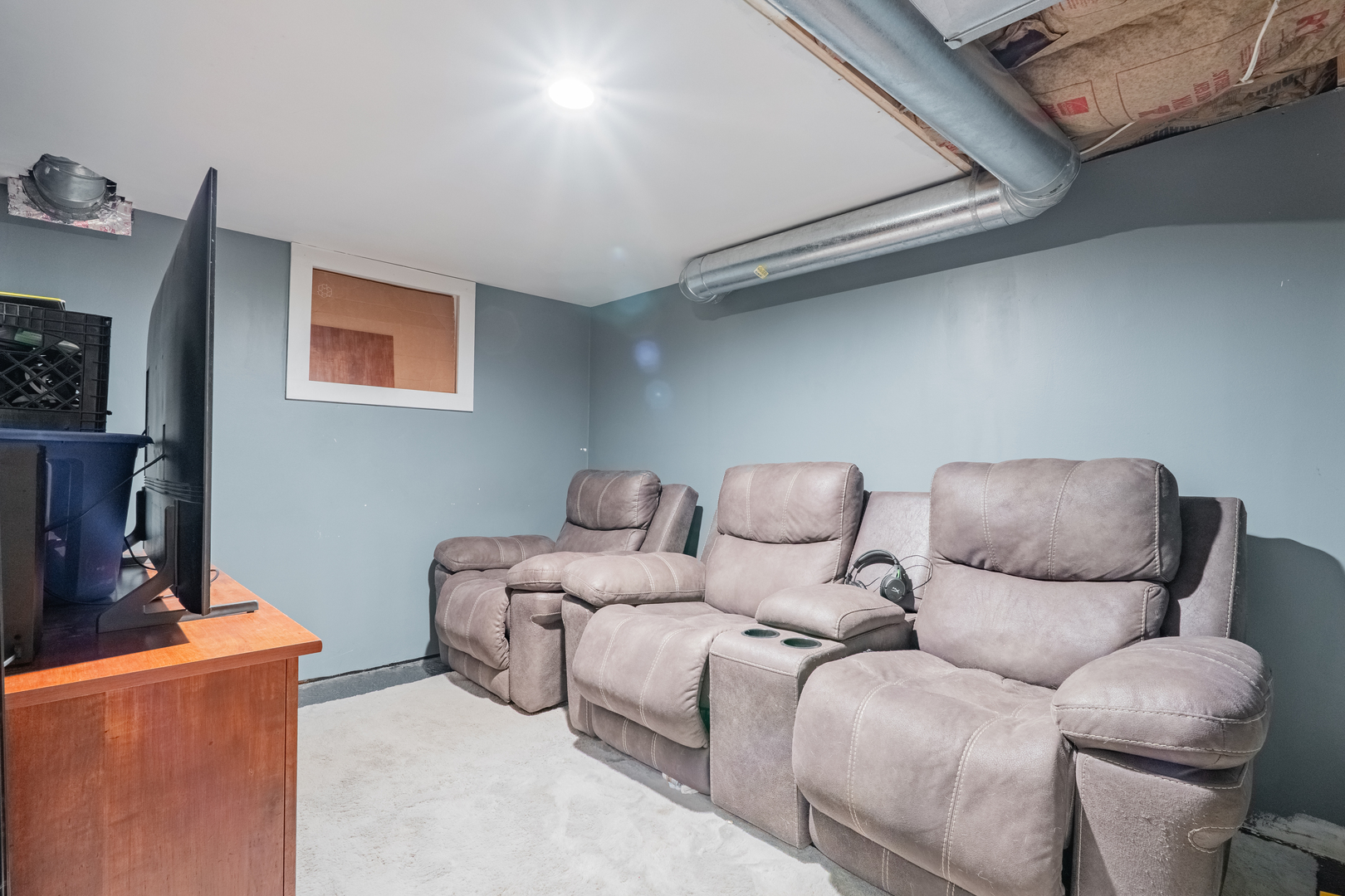 310 South Pleasant Street Princeton, IL 61356 - Photo 25 of 36 a living room with furniture and a flat screen tv