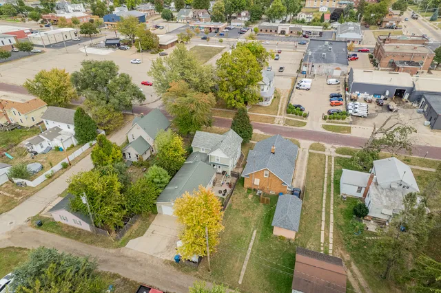 an aerial view of a house with outdoor space