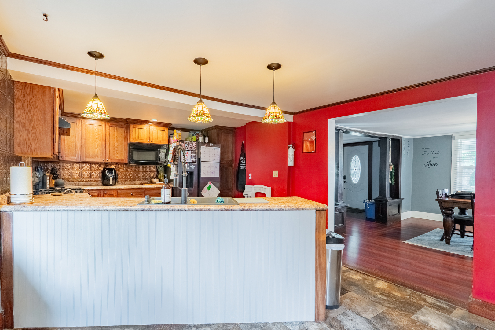 310 South Pleasant Street Princeton, IL 61356 - Photo 9 of 36 a view of a living room and kitchen