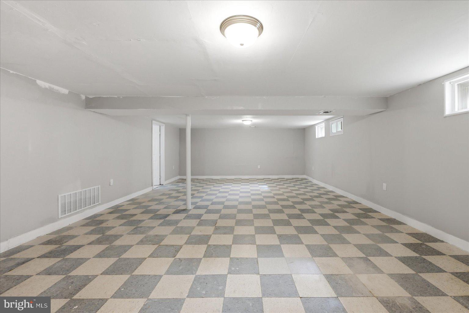9110 Meadow Heights Road Randallstown, MD 21133 - Photo 26 of 39 Spacious, versatile basement retreat.