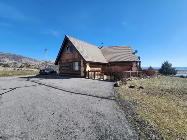 a lobby with furniture and window