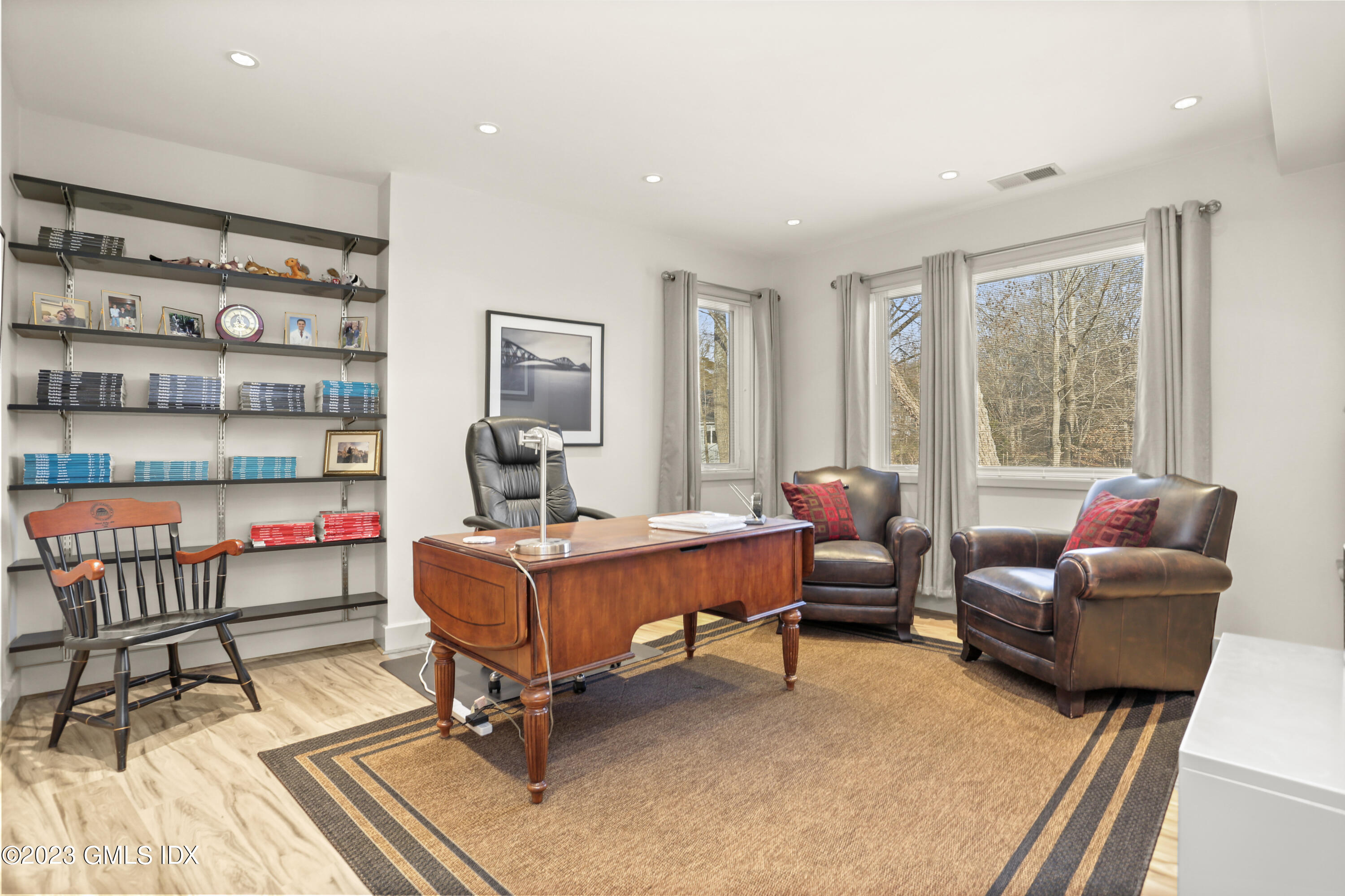 245 Long Close Road Stamford, CT 06902 - Photo 25 of 53 a living room with furniture a rug and a large window