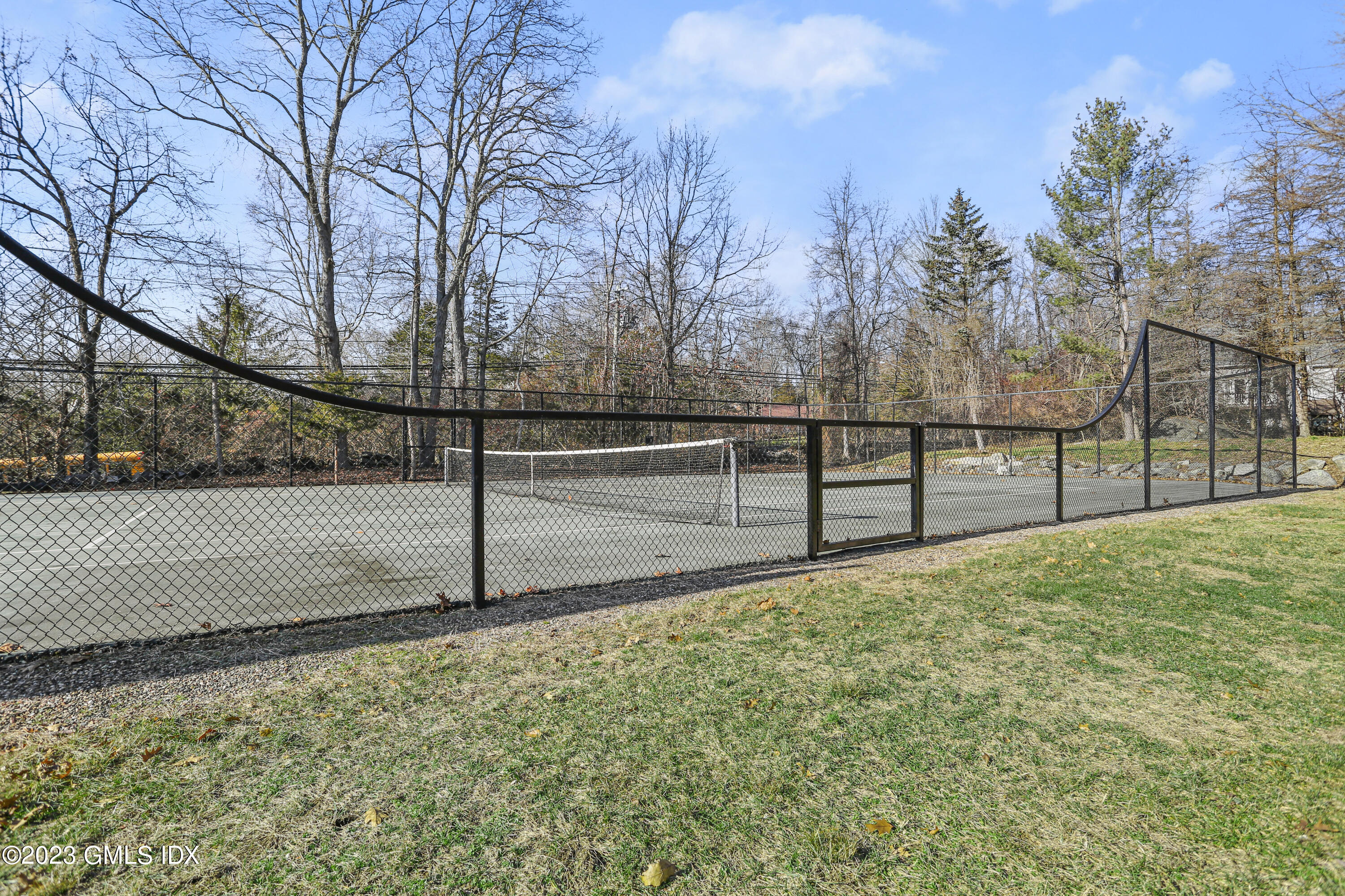 245 Long Close Road Stamford, CT 06902 - Photo 5 of 53 a view of backyard with wooden fence