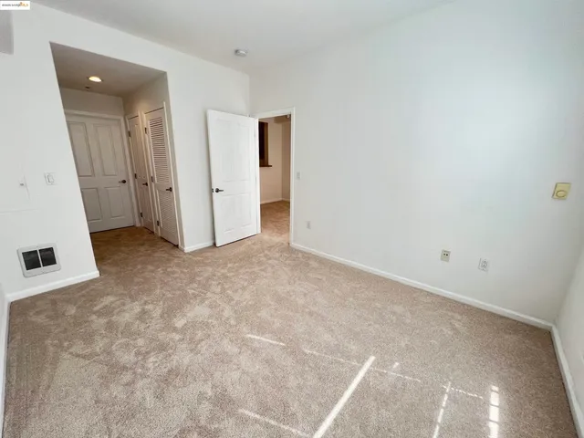 an empty room with closet