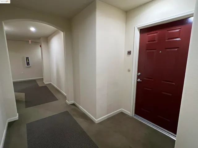 wooden floor in a hall with an entryway