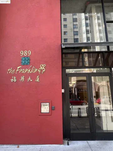 a view of a building with a street