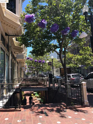 a view of a cafe with sitting area