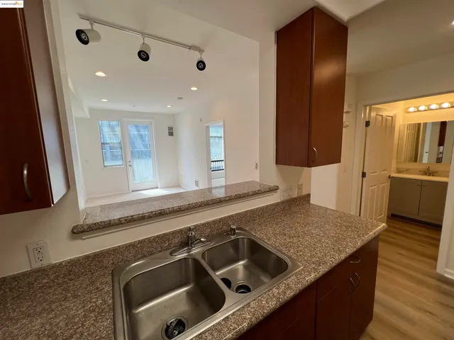 a kitchen with a stove and a sink
