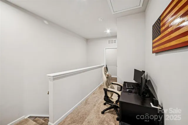 a bed room with a bed and a chandelier