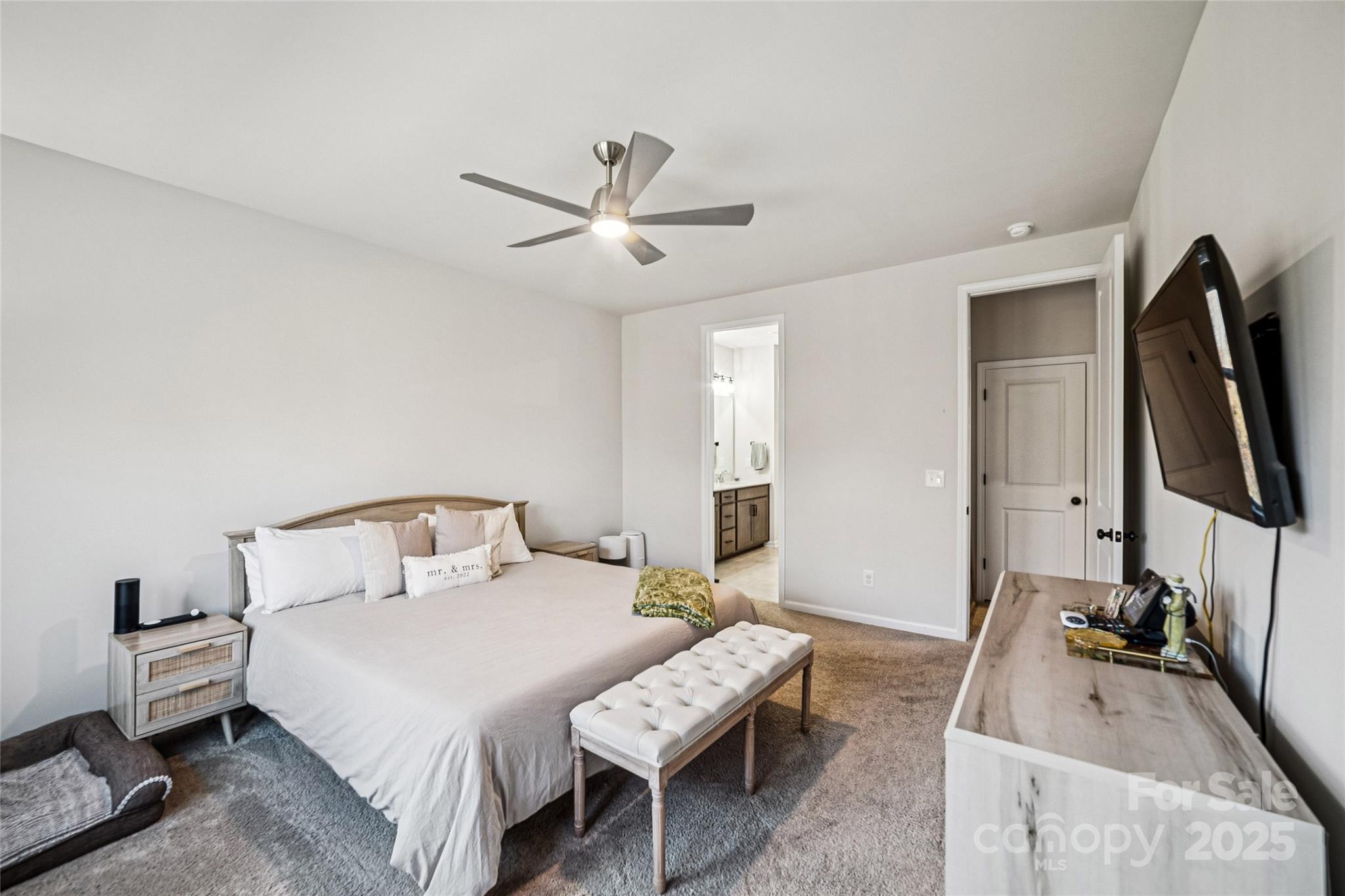 1103 Grays Ml Road Charlotte, NC 28215 - Photo 13 of 25 a bedroom with a bed and a couch