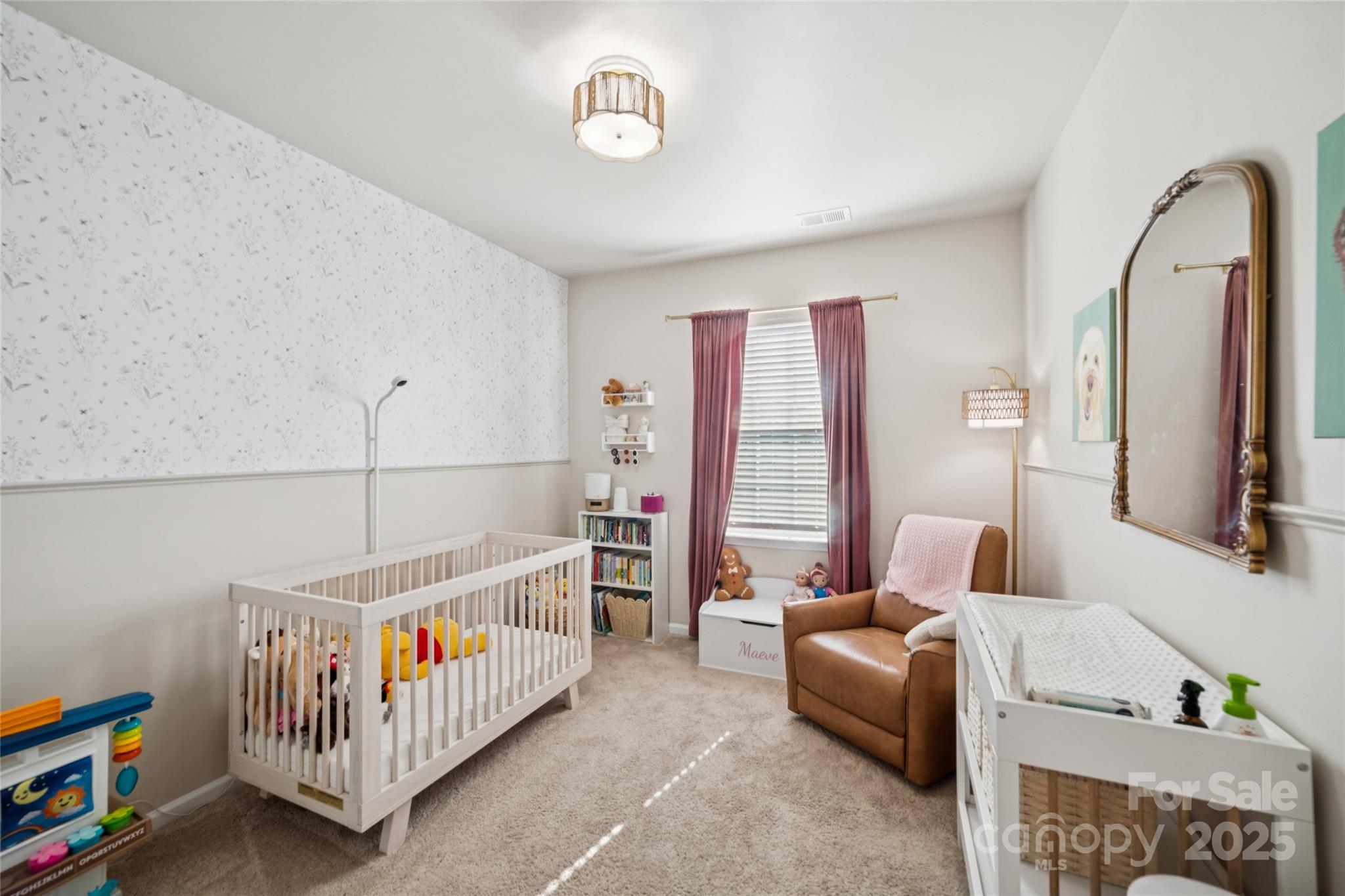 1103 Grays Ml Road Charlotte, NC 28215 - Photo 21 of 25 a bedroom with furniture and a window