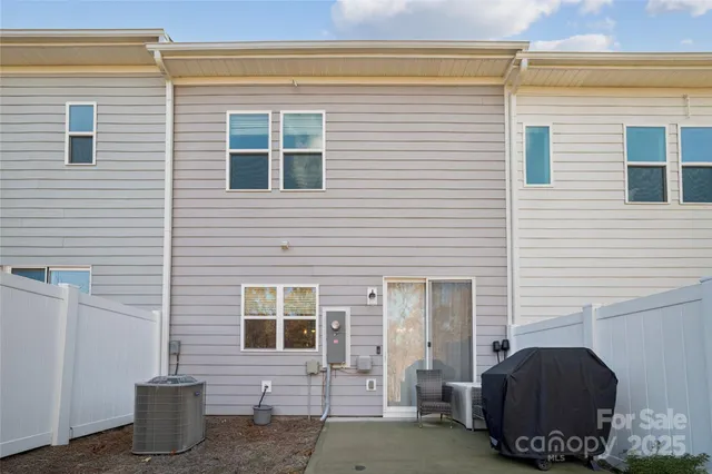 a view of a house with a yard and garage