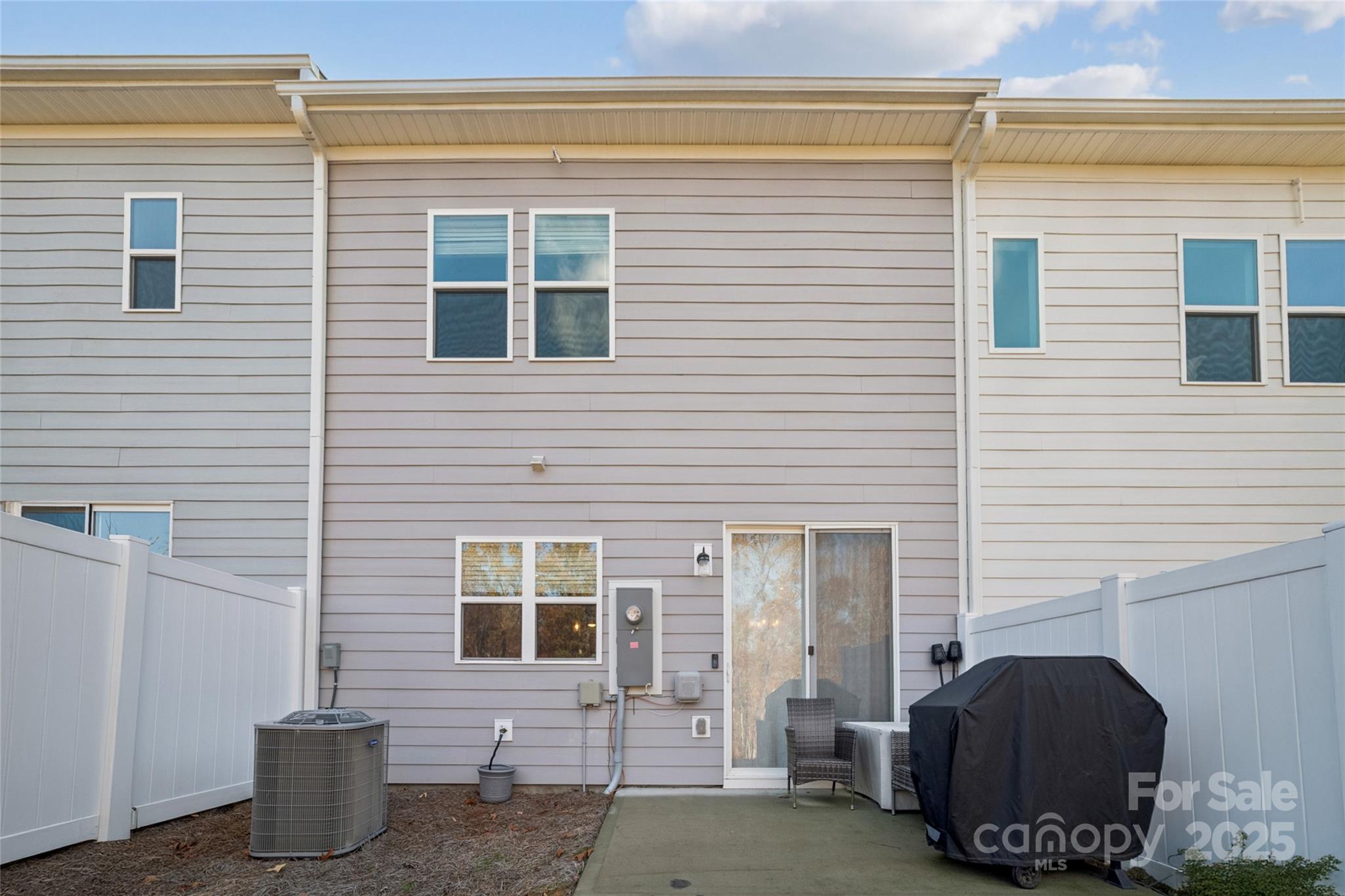 1103 Grays Ml Road Charlotte, NC 28215 - Photo 24 of 25 a brick house with four windows