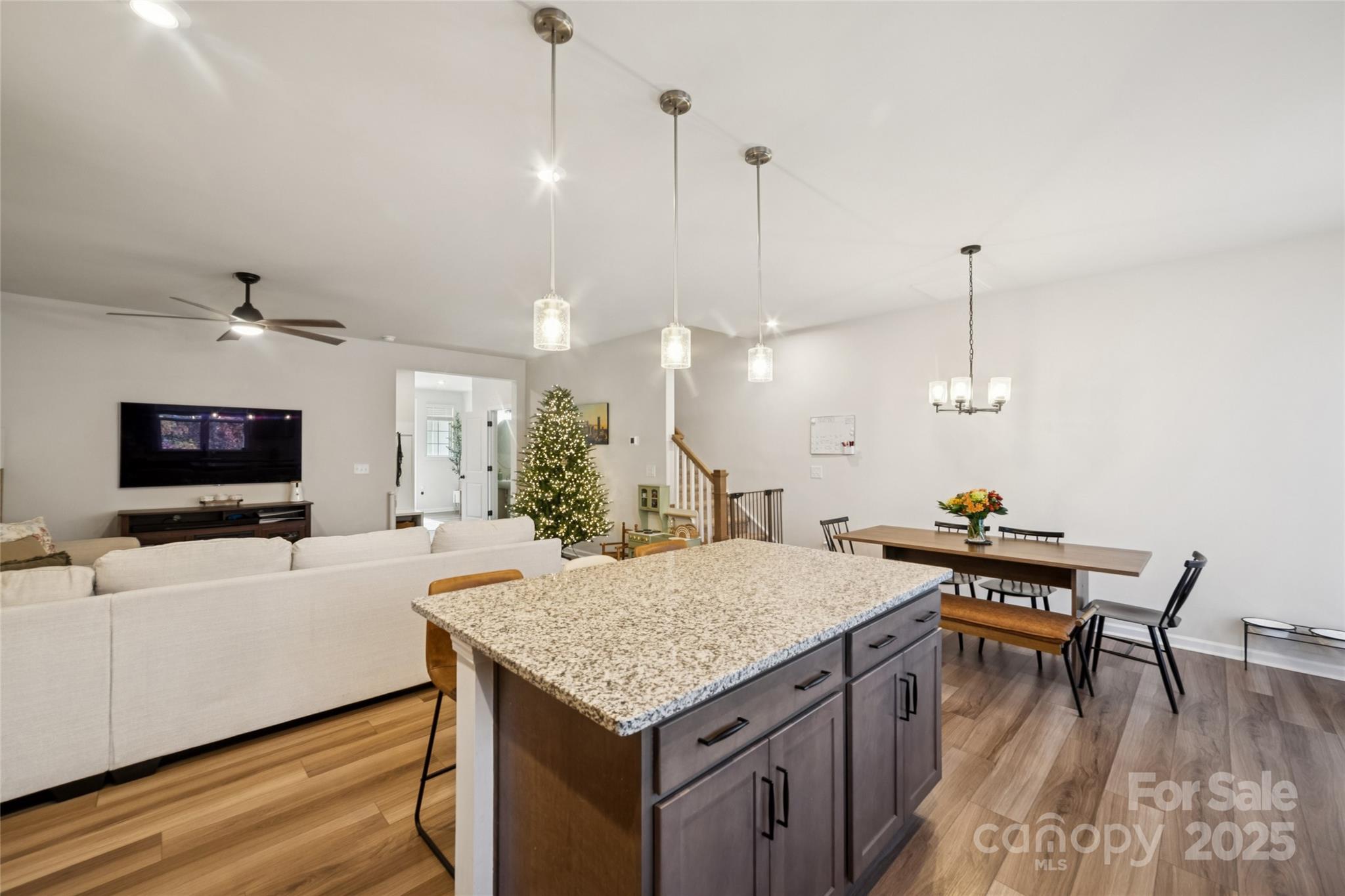 1103 Grays Ml Road Charlotte, NC 28215 - Photo 10 of 25 a living room with furniture and a flat screen tv