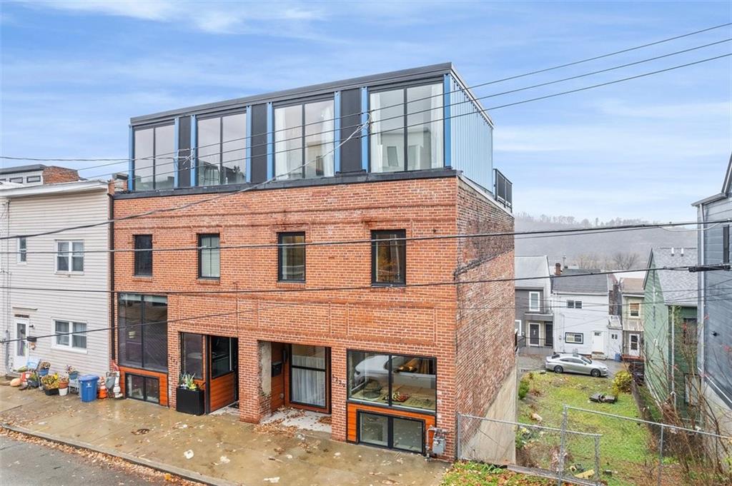 5229 Duncan Street Pittsburgh, PA 15201 - Photo 1 of 16 a view of a building with a window