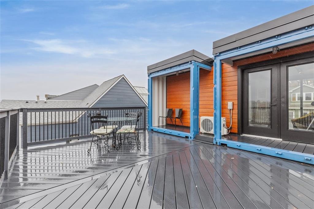 5229 Duncan Street Pittsburgh, PA 15201 - Photo 11 of 16 a view of a house with wooden deck and furniture