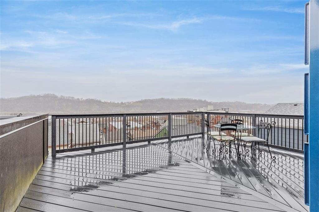 5229 Duncan Street Pittsburgh, PA 15201 - Photo 12 of 16 a view of balcony with wooden floor