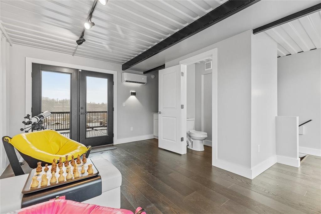 5229 Duncan Street Pittsburgh, PA 15201 - Photo 9 of 16 a living room with a couch and a table