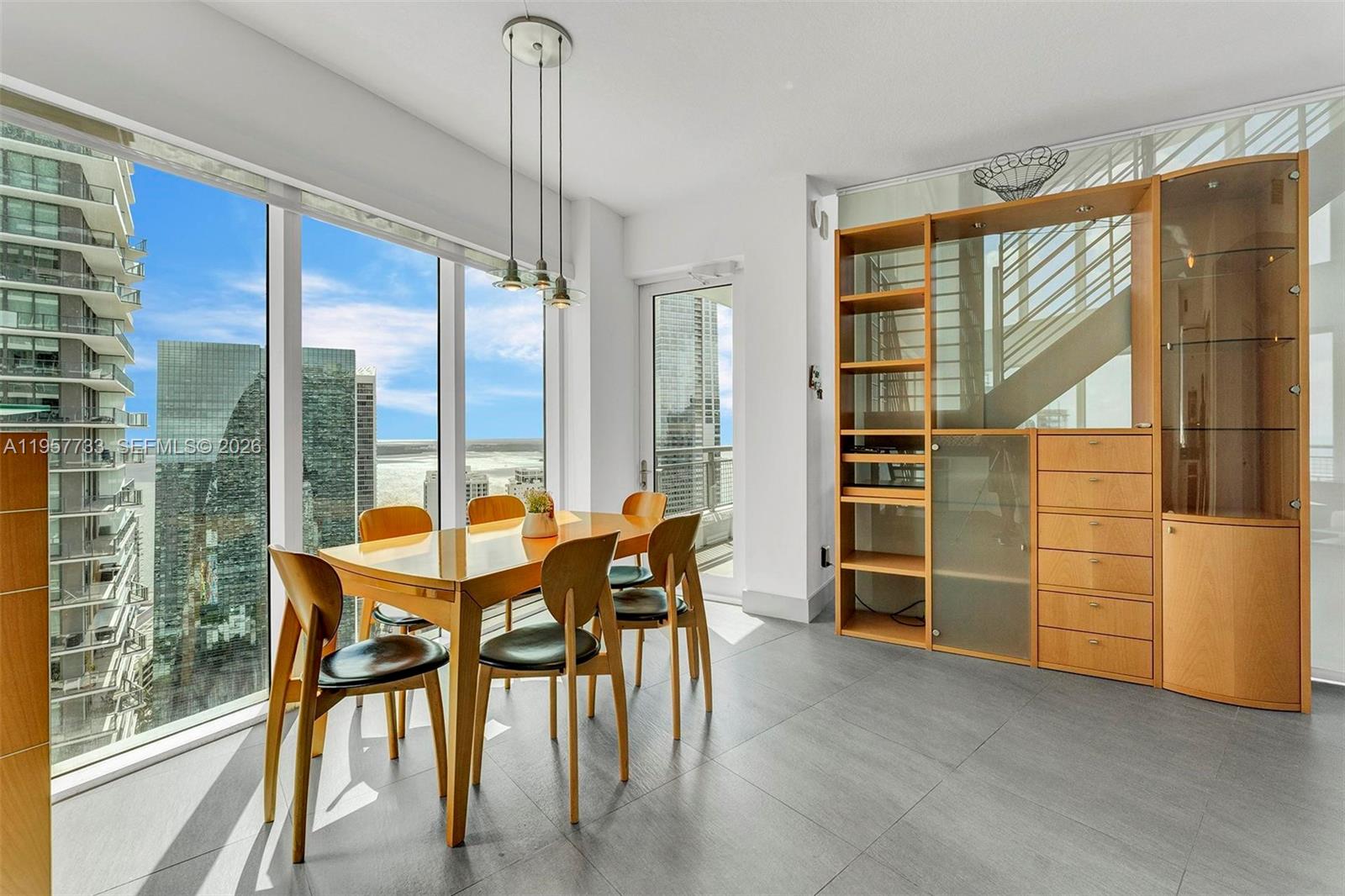 60 Southwest 13th Street, Unit 3400 Miami, FL 33130 - Photo 13 of 50 a view of a dining room with furniture window and outside view