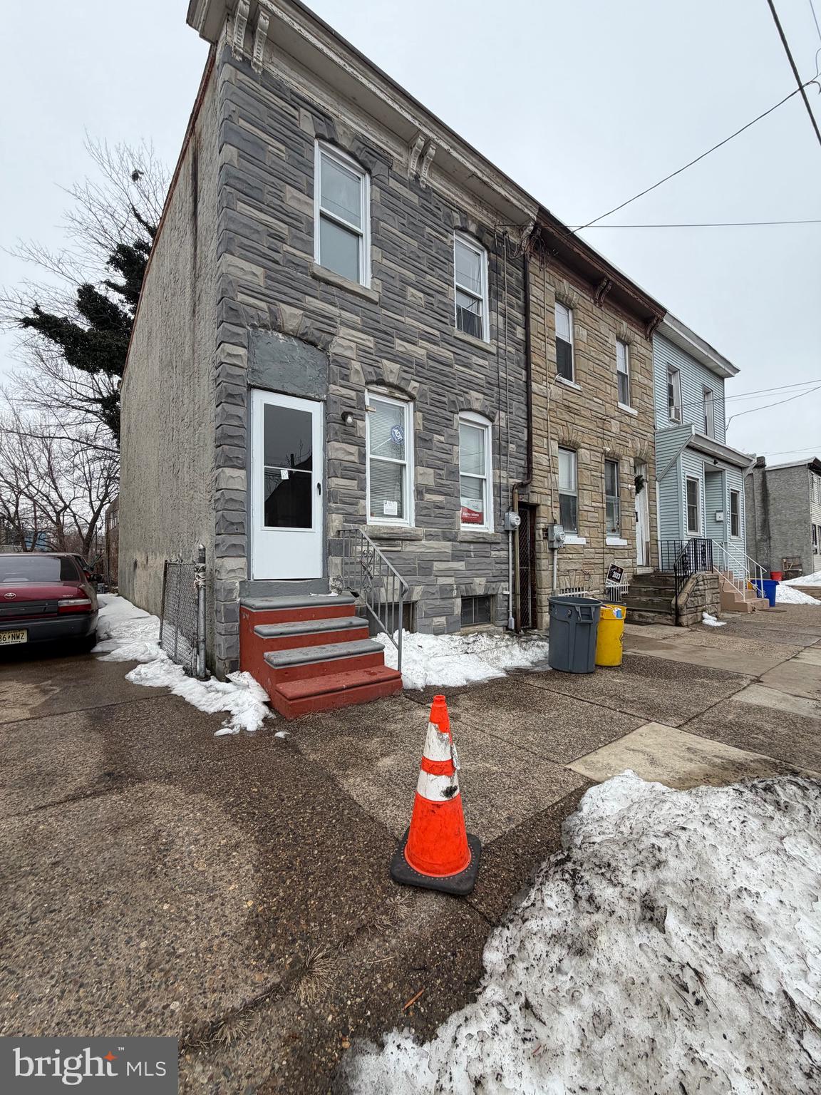 824 South 8th Street Camden, NJ 08103 - Photo 1 of 11 a backyard of a house with barbeque oven table and chairs