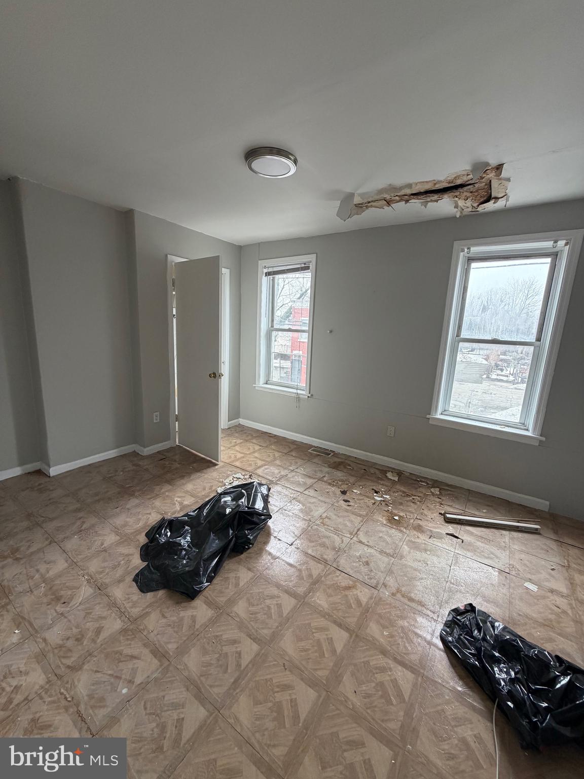 824 South 8th Street Camden, NJ 08103 - Photo 8 of 11 a bed room with a bed and a window