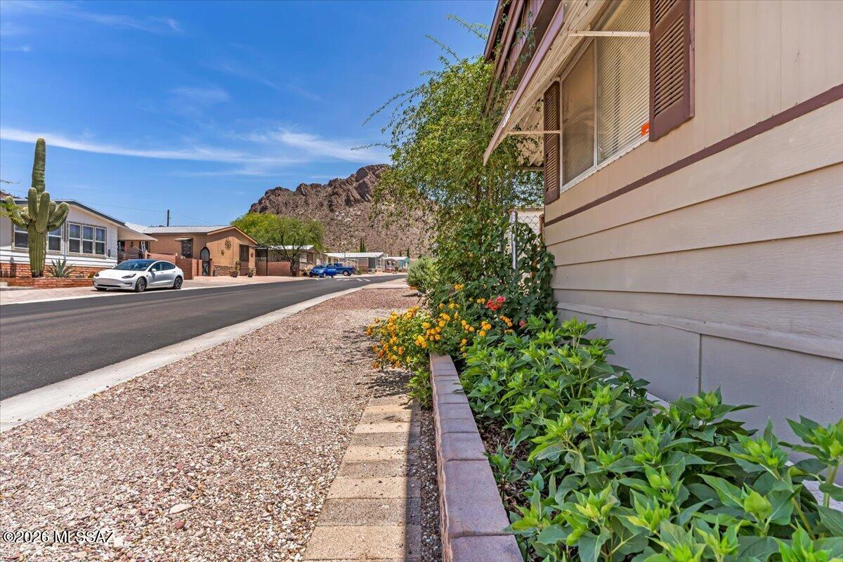5379 West Rafter Cir Street Tucson, AZ 85713 - Photo 33 of 38 a view of a street with cars on road