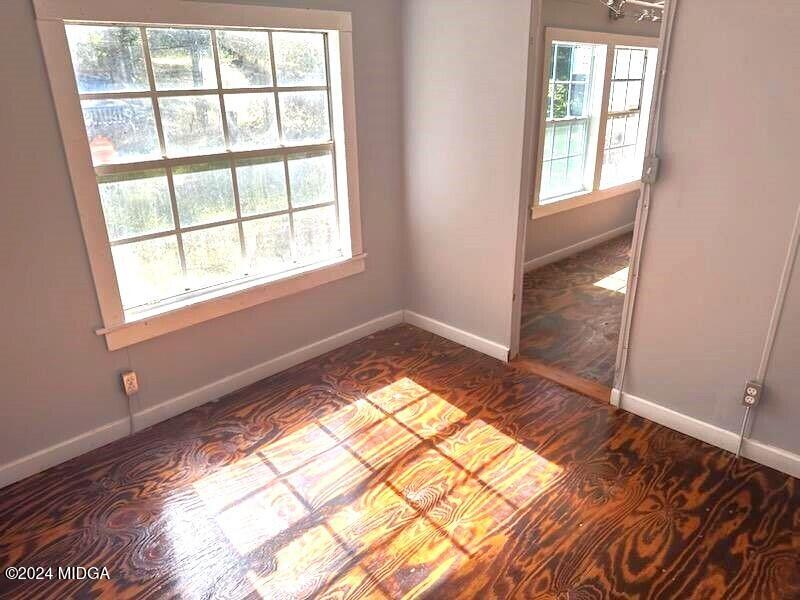 3091 Tribble Road Fort Valley, GA 31030 - Photo 2 of 7 a view of an empty room and window